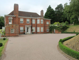 A large house with a large driveway