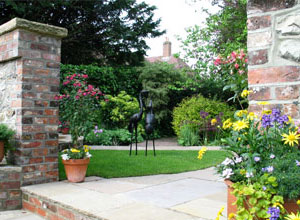 Patio area with bird statue 